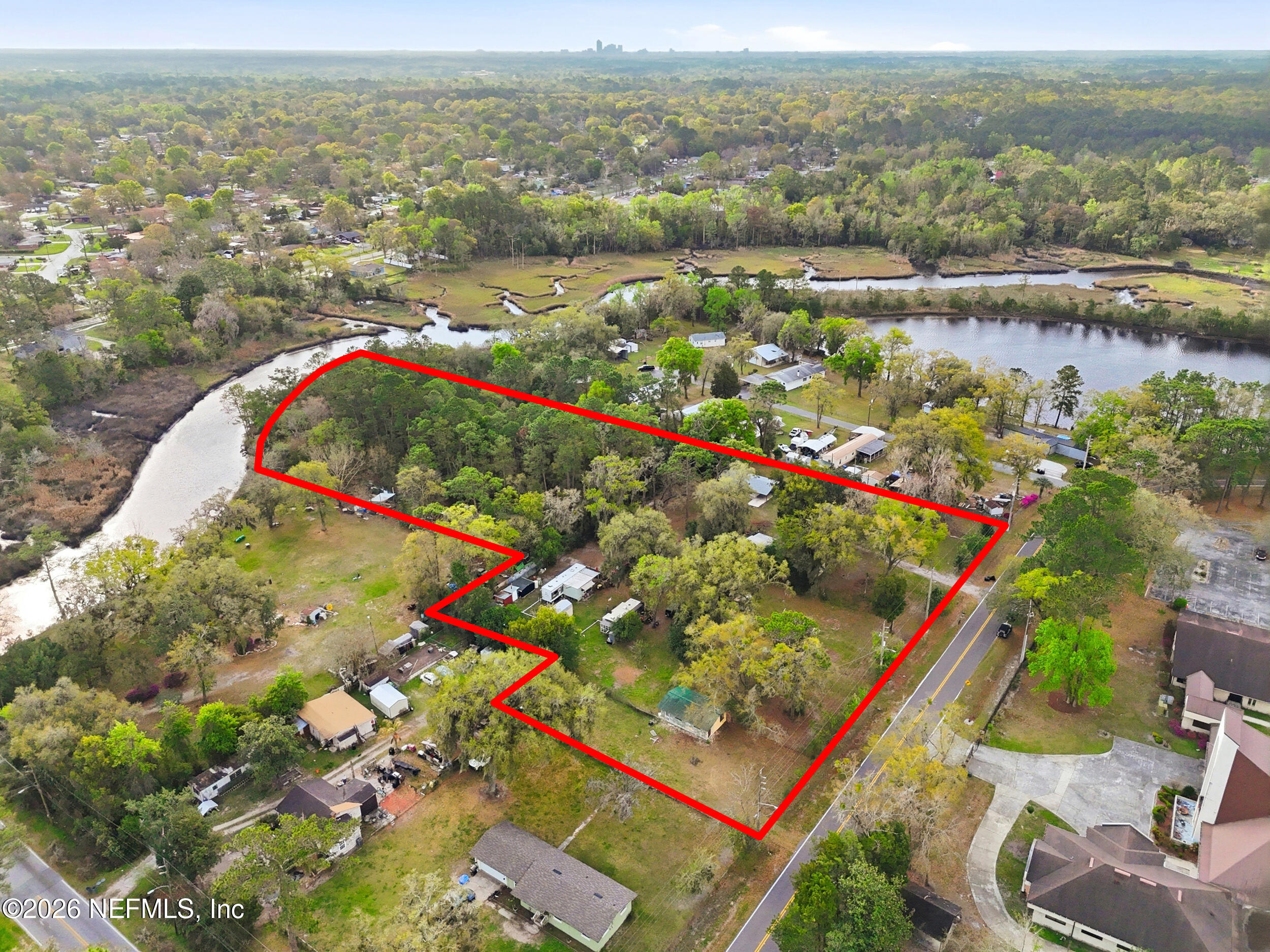 9843 Wagner Road Jacksonville, FL 32219 - Photo 40 of 40 an aerial view of lake and residential houses with outdoor space
