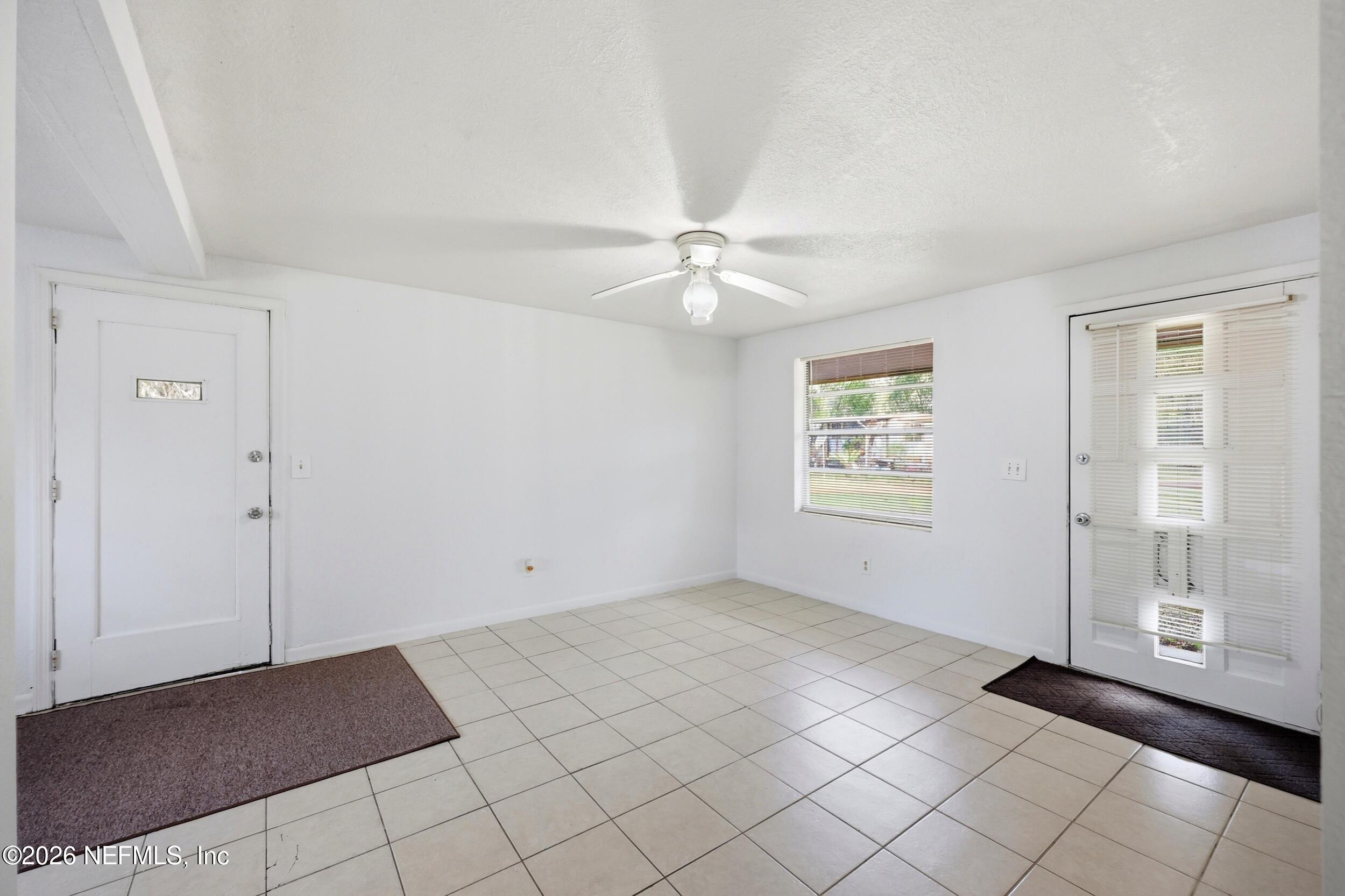 9843 Wagner Road Jacksonville, FL 32219 - Photo 6 of 40 a view of an empty room with window