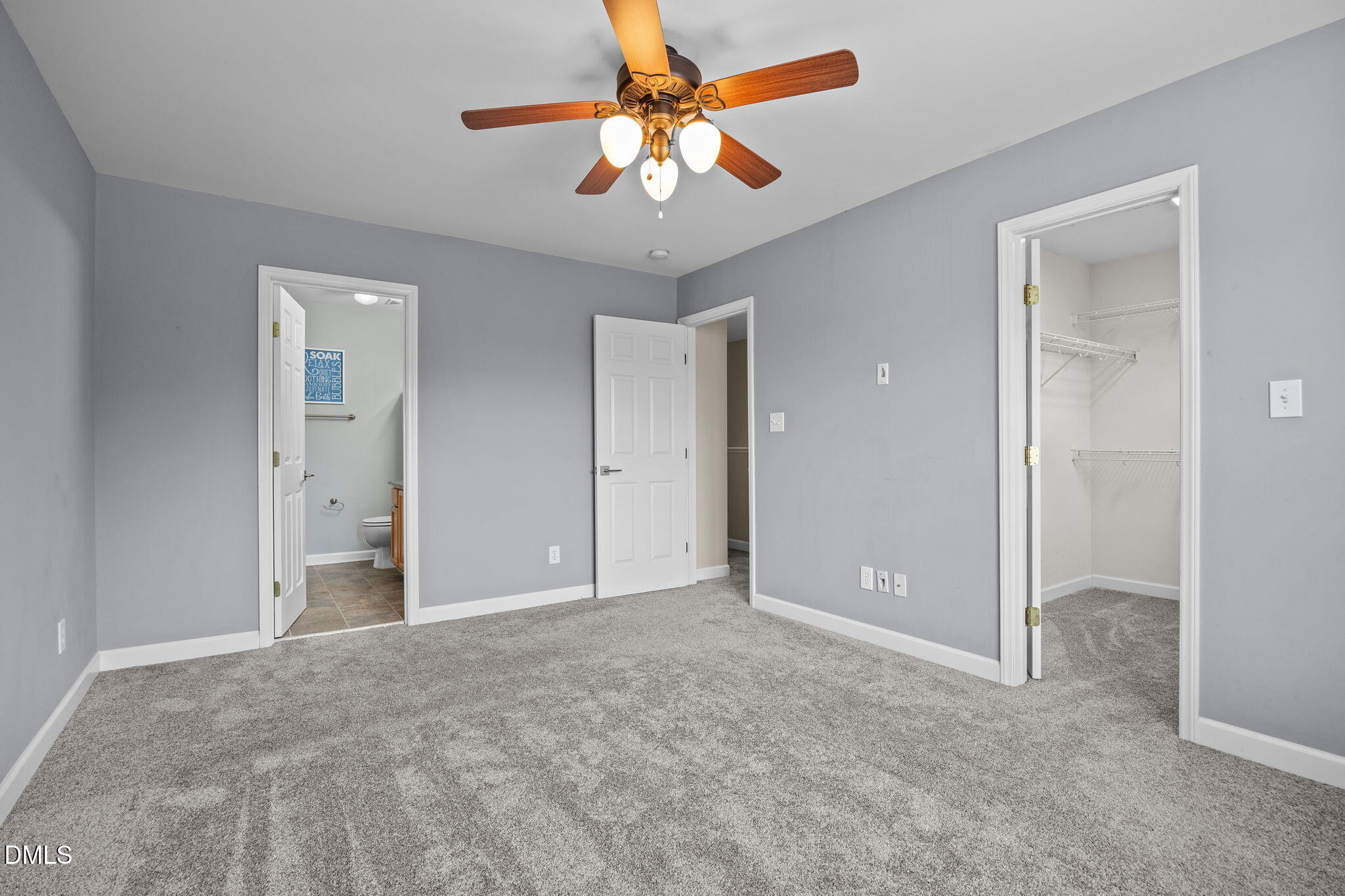 4522 Centrebrook Circle Raleigh, NC 27616 - Photo 11 of 24 a view of an empty room and chandelier fan