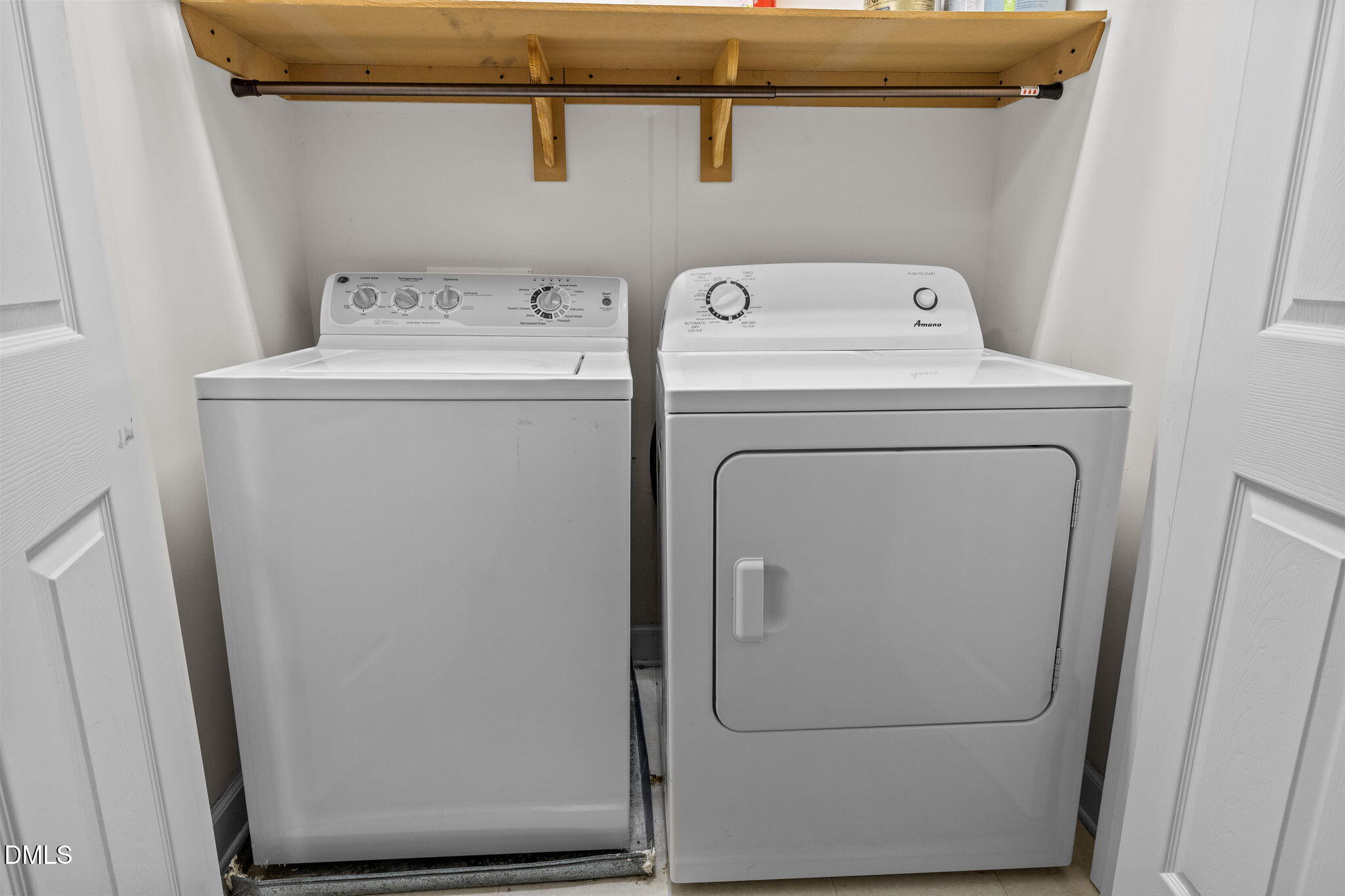 4522 Centrebrook Circle Raleigh, NC 27616 - Photo 16 of 24 a utility room with dryer and washer
