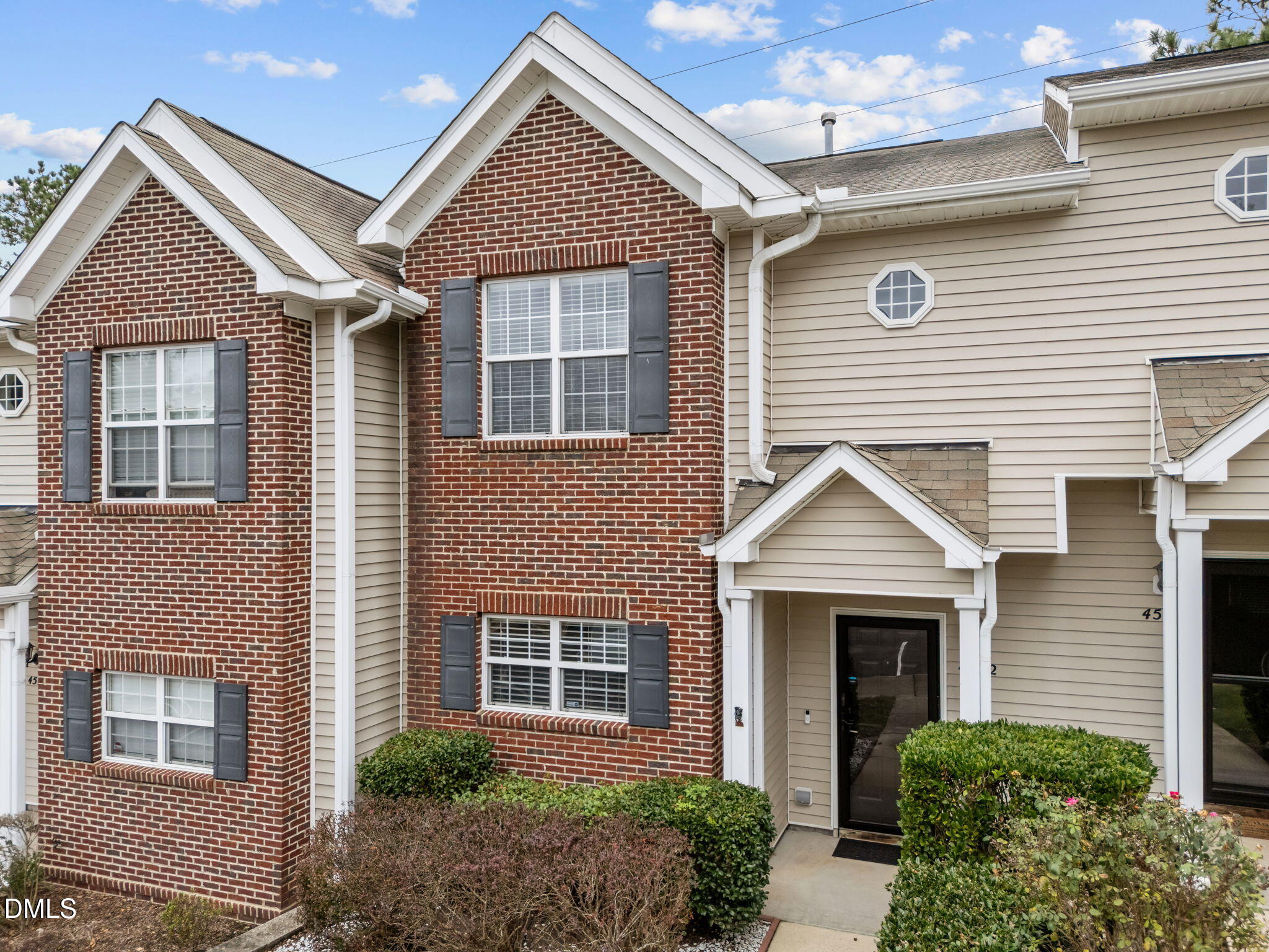 4522 Centrebrook Circle Raleigh, NC 27616 - Photo 20 of 24 a front view of a house with garden