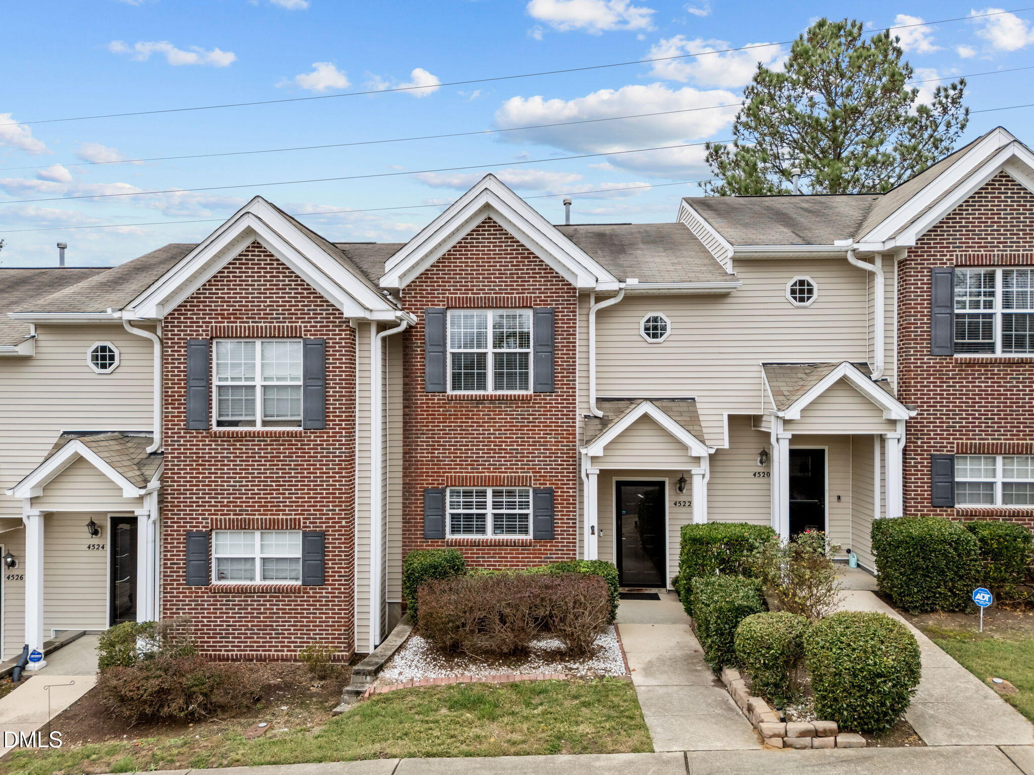 4522 Centrebrook Circle Raleigh, NC 27616 - Photo 21 of 24 a front view of a house with garden
