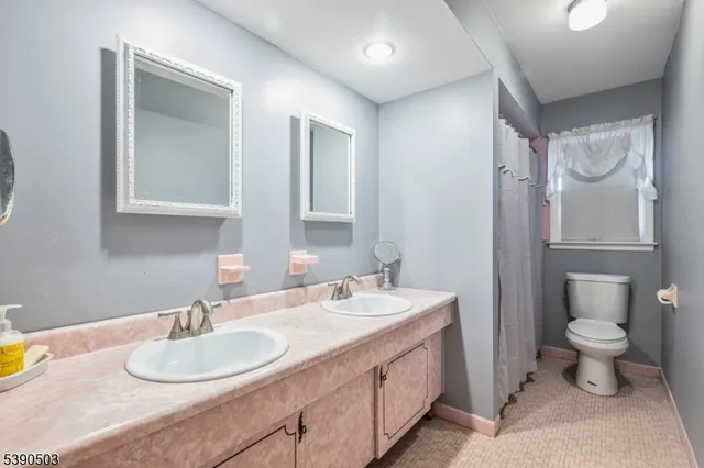 a view of balcony with wooden floor and fence