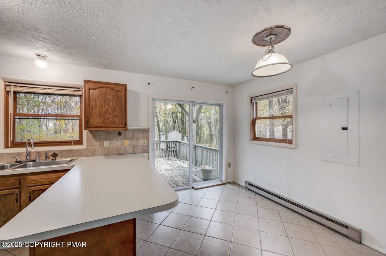 38 Spokane Road Albrightsville, PA 18210 - Photo 24 of 69 a large white kitchen with a large window