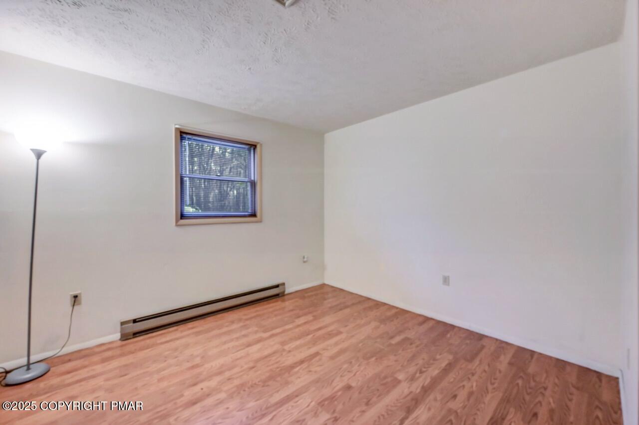 38 Spokane Road Albrightsville, PA 18210 - Photo 28 of 69 a view of empty room with wooden floor