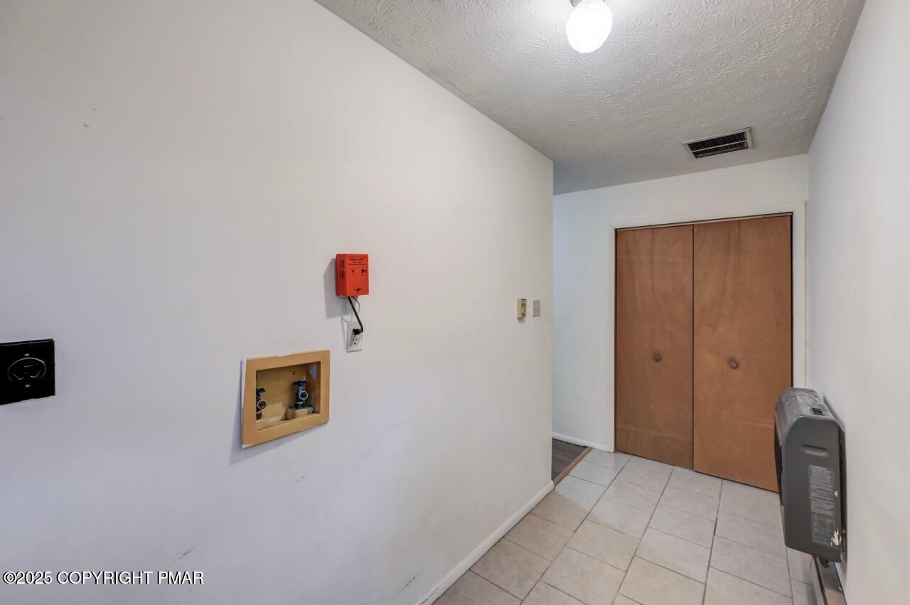 38 Spokane Road Albrightsville, PA 18210 - Photo 38 of 69 a view of a hallway with a elevator
