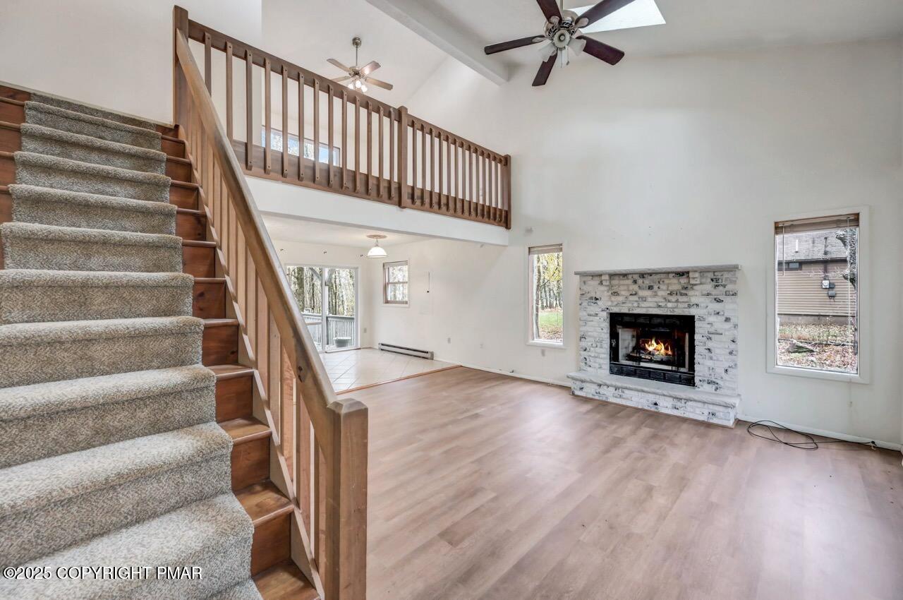 38 Spokane Road Albrightsville, PA 18210 - Photo 41 of 69 a view of an entryway with wooden floor and a fireplace