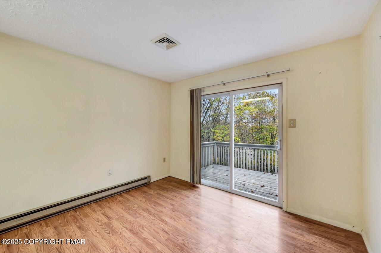 38 Spokane Road Albrightsville, PA 18210 - Photo 51 of 69 a view of a room with wooden floor and a window