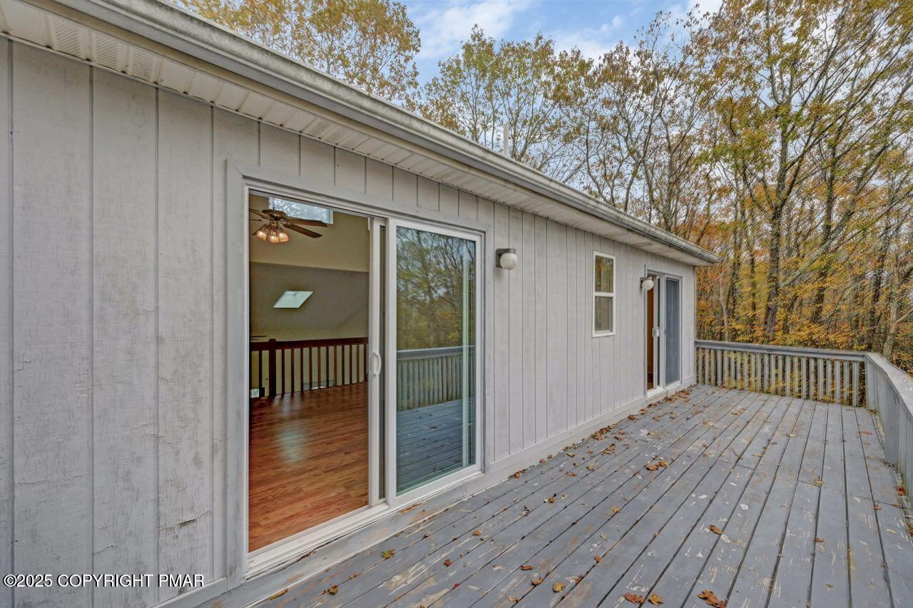 38 Spokane Road Albrightsville, PA 18210 - Photo 62 of 69 a view of backyard with a deck and wooden floor