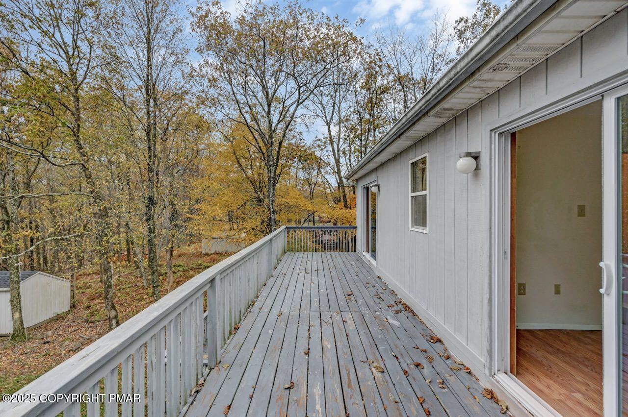 38 Spokane Road Albrightsville, PA 18210 - Photo 69 of 69 a view of balcony with wooden floor and fence