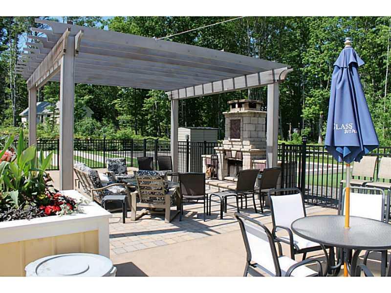 1 Old County Road, Unit 105 Wells, ME 04090 - Photo 22 of 34 Other. Clubhouse Patio and fireplace