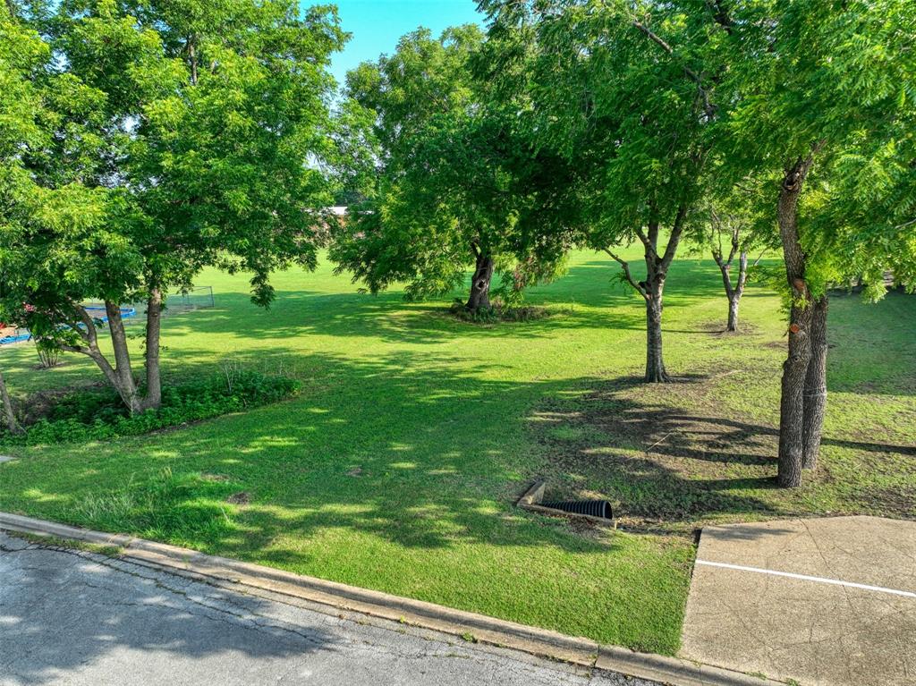723 East Main Street Lancaster, TX 75146 - Photo 8 of 11 a view of a park with large trees