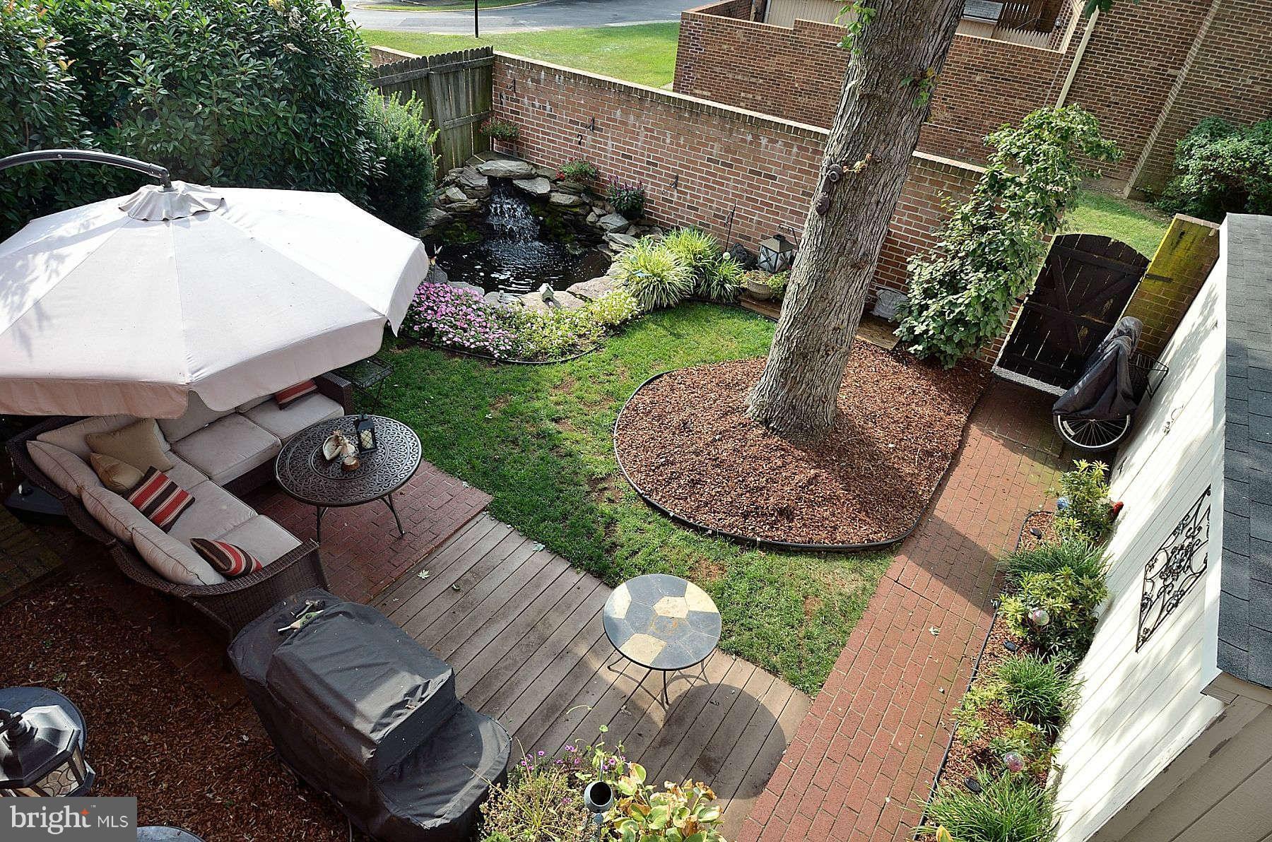 8521 Forrester Boulevard Springfield, VA 22152 - Photo 2 of 28 an aerial view of a house with garden space and street view