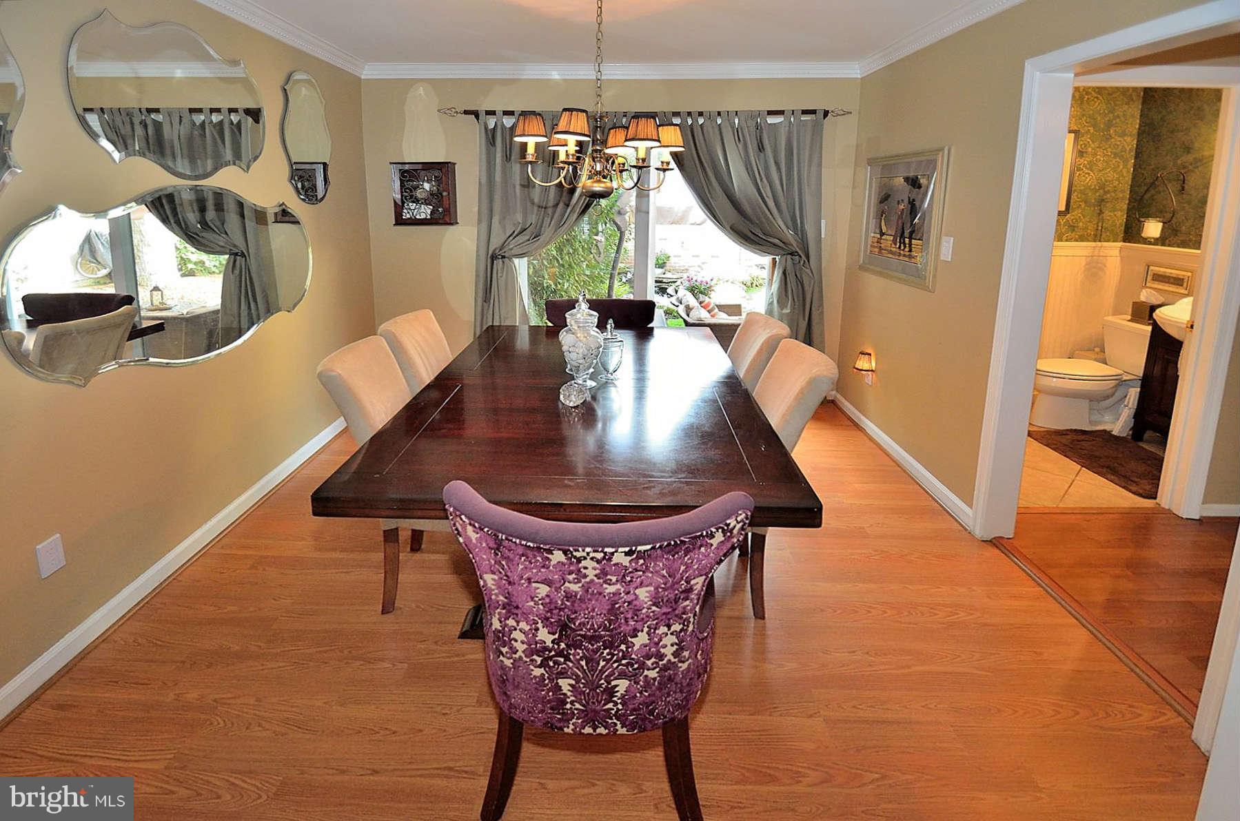 8521 Forrester Boulevard Springfield, VA 22152 - Photo 13 of 28 a dining room with furniture and window