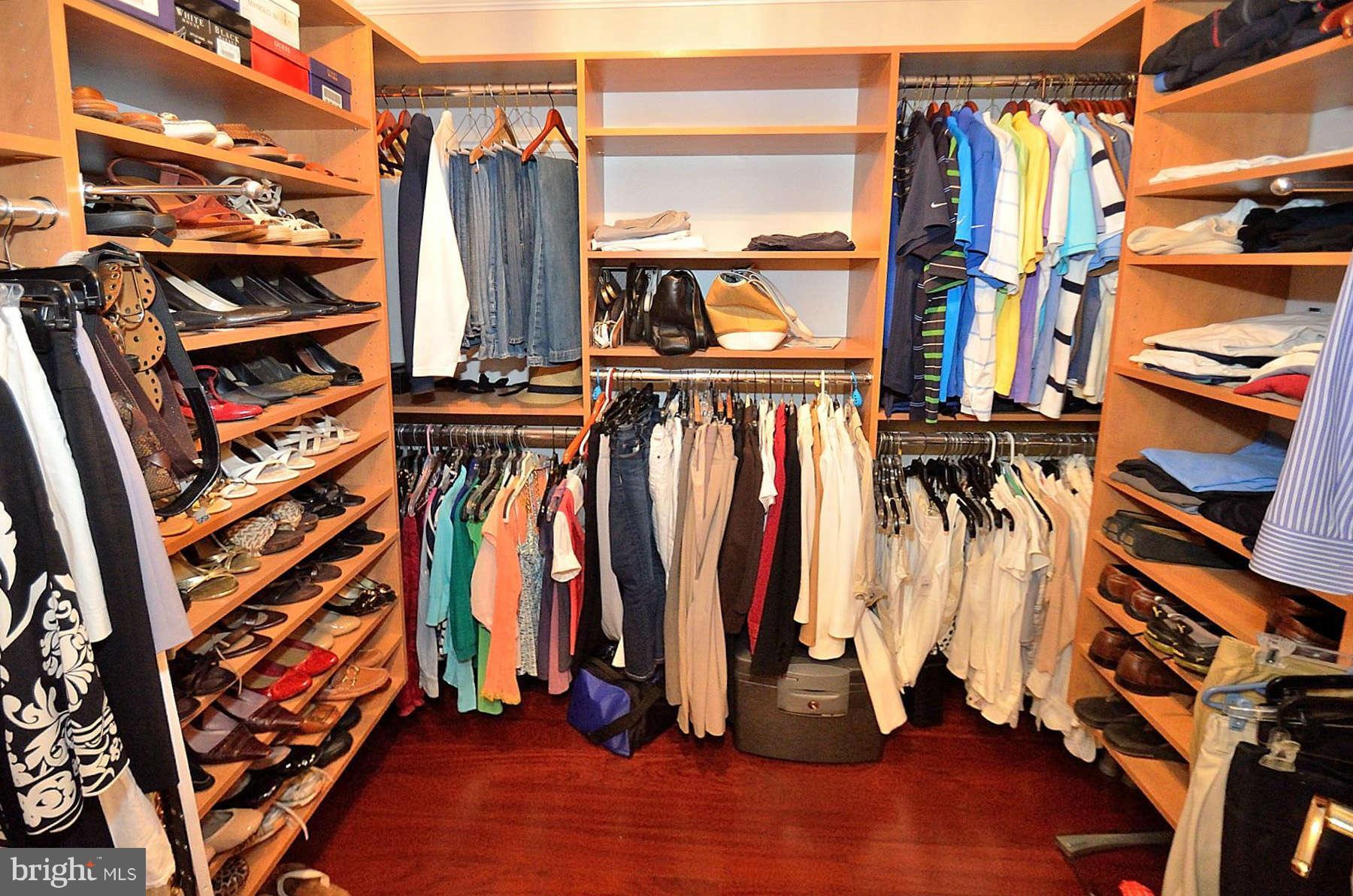 8521 Forrester Boulevard Springfield, VA 22152 - Photo 19 of 28 a view of walk in closet with clothes and shoes