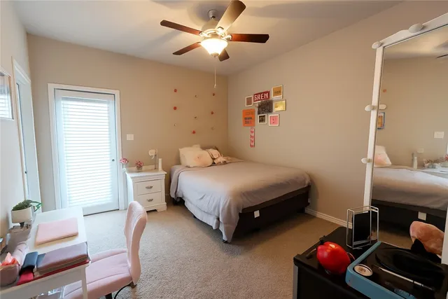 a bedroom with a bed furniture and a window