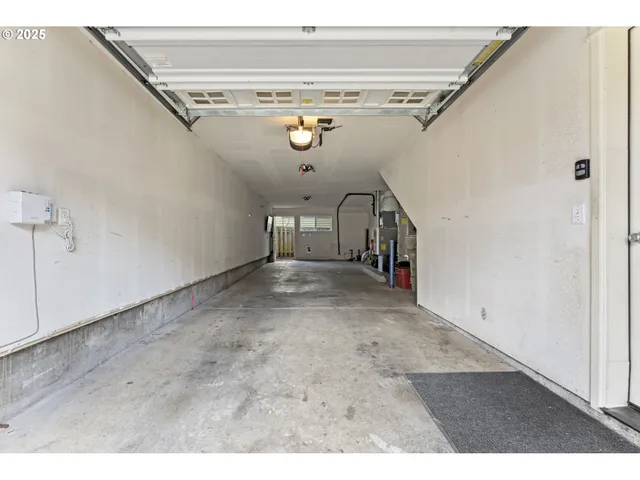a view of a hallway with stairs
