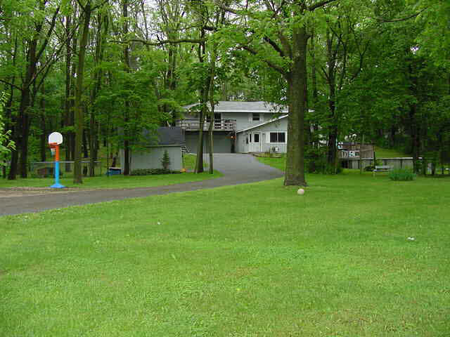 7949 Pomeroy Road Rockton, IL 61072 - Photo 1 of 6 a view of a house with backyard