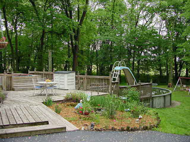 7949 Pomeroy Road Rockton, IL 61072 - Photo 6 of 6 a view of backyard with swimming pool