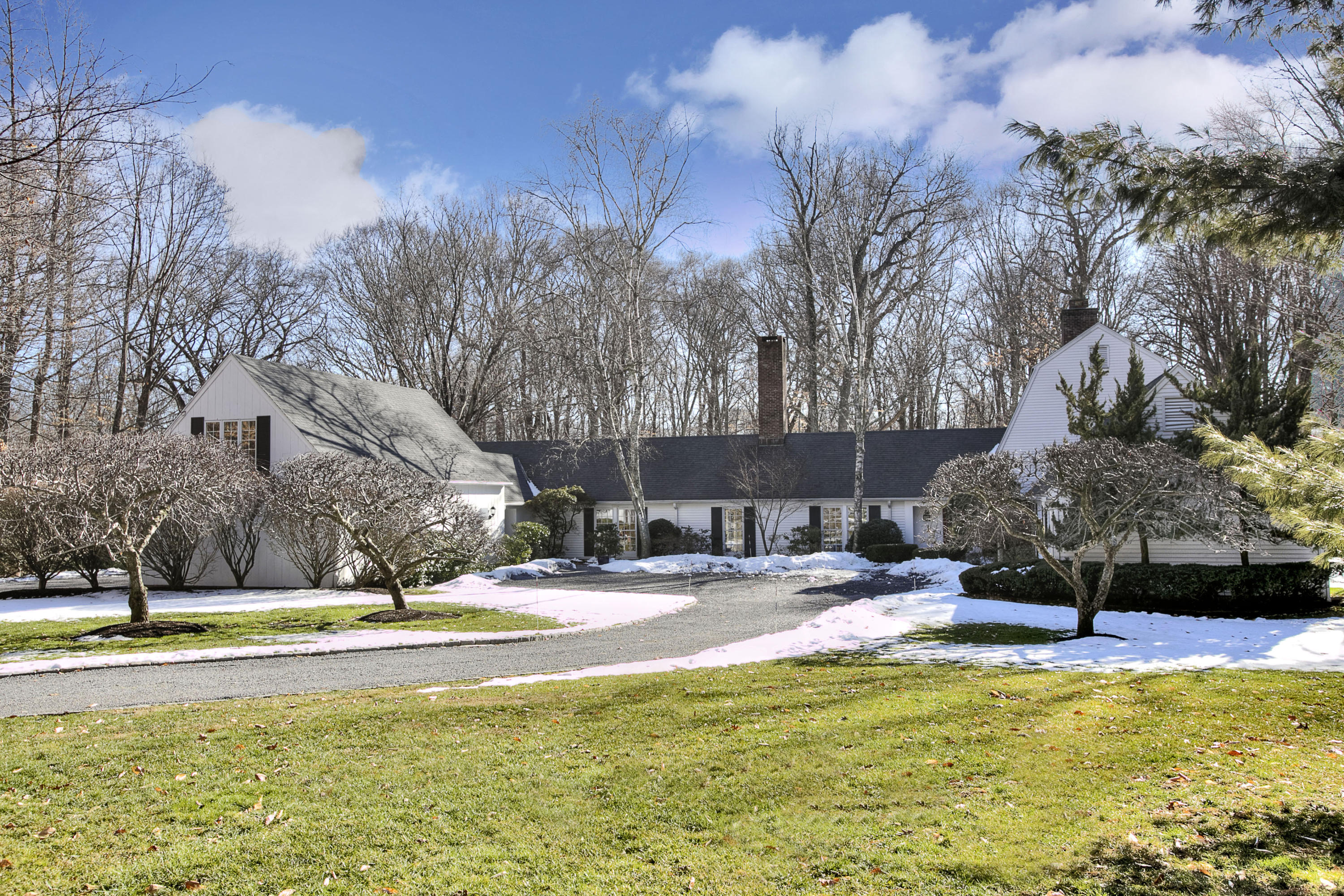 a view of swimming pool with outdoor seating and trees