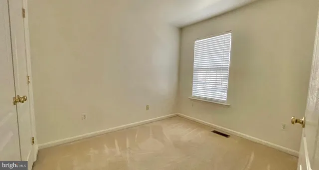 a view of a room with a window