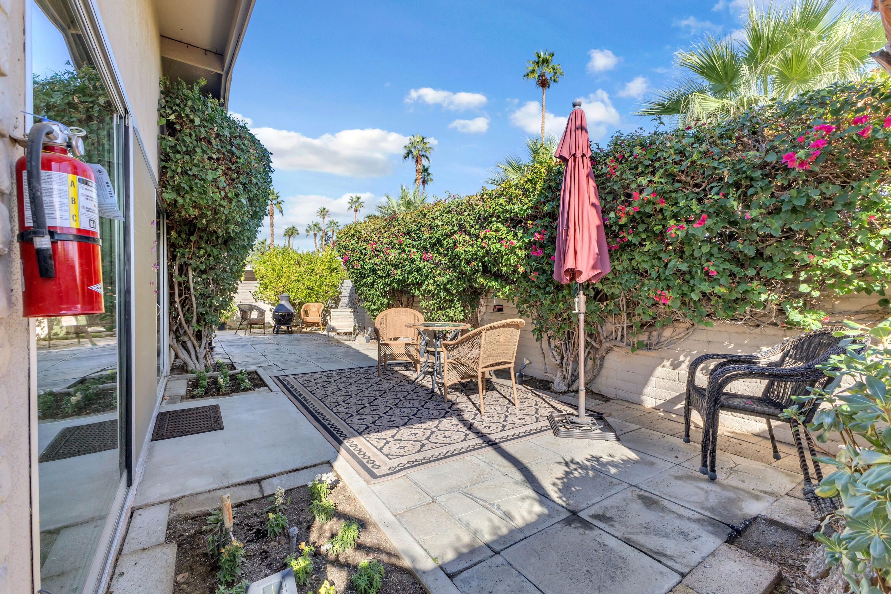 69850 Hwy 111 Rancho Mirage Ca, Unit 11 Rancho Mirage, CA 92270 - Photo 26 of 48 an outdoor space with furniture