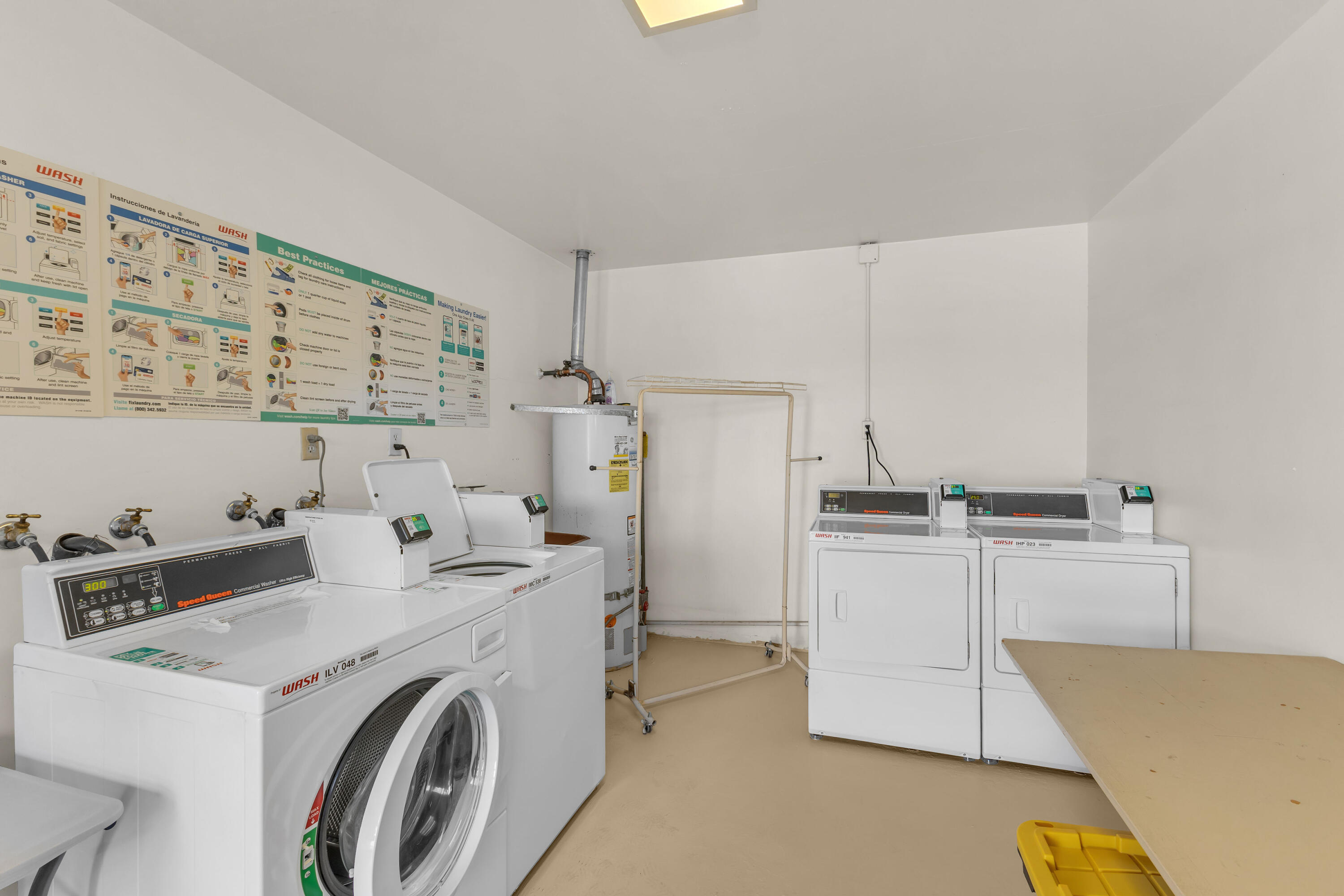 69850 Hwy 111 Rancho Mirage Ca, Unit 11 Rancho Mirage, CA 92270 - Photo 27 of 48 a utility room with cabinets washer and dryer