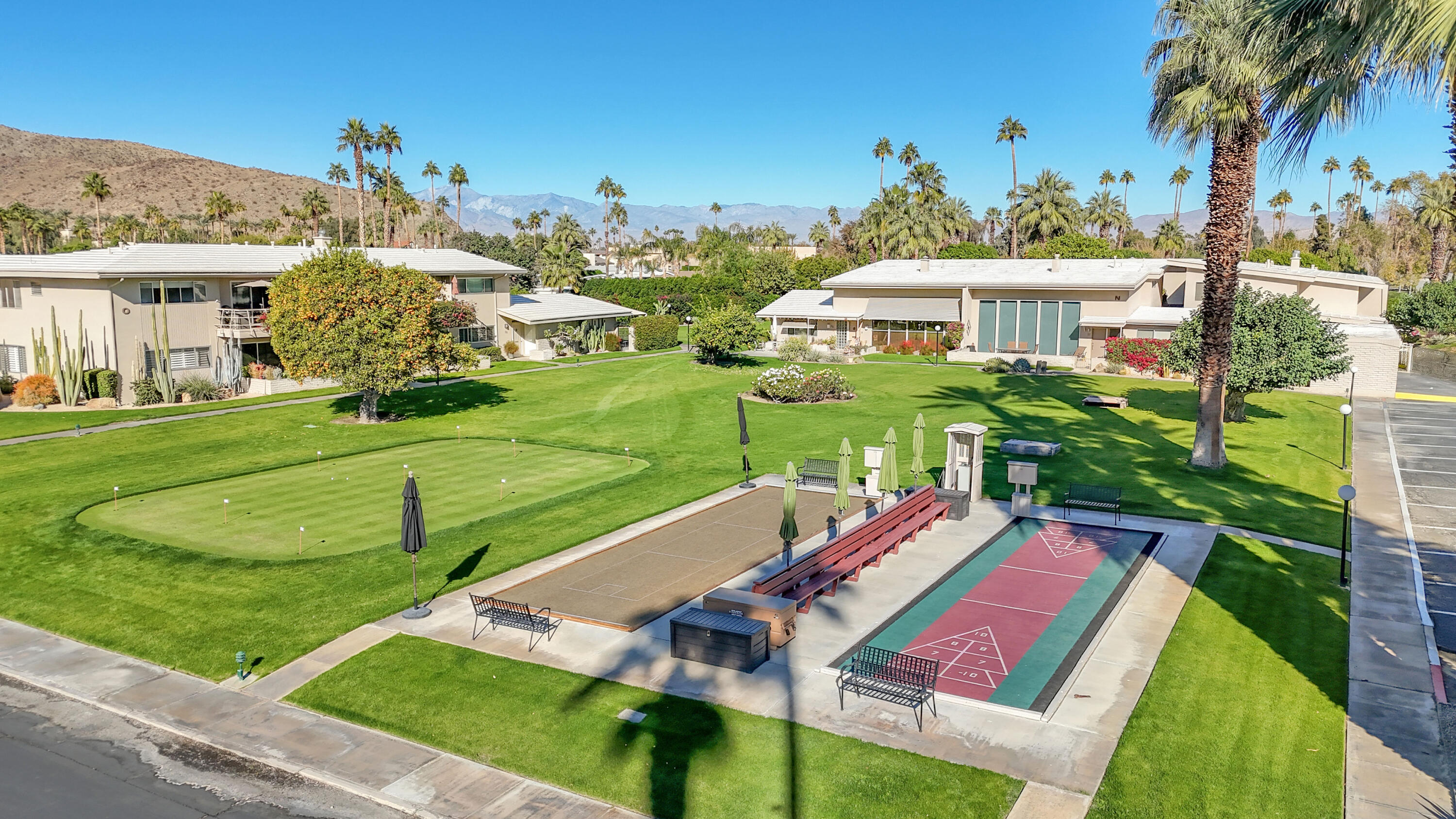 69850 Hwy 111 Rancho Mirage Ca, Unit 11 Rancho Mirage, CA 92270 - Photo 36 of 48 a view of yard with patio and lake view
