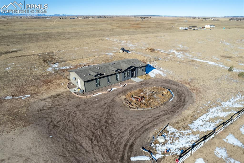 7880 J D Johnson Road Peyton, CO 80831 - Photo 19 of 50 a view of an ocean and beach