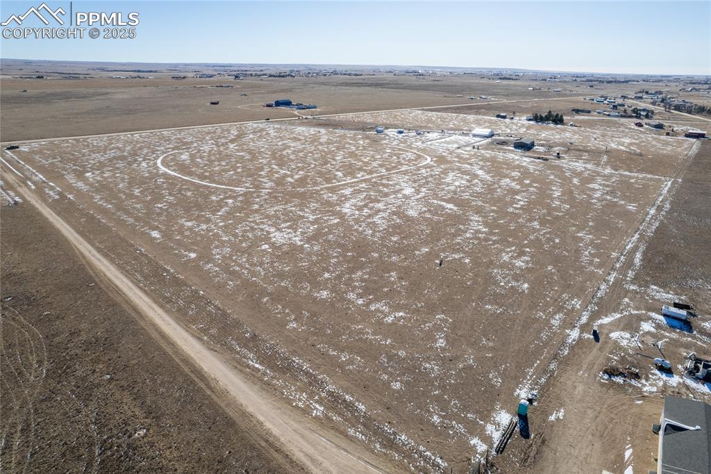 7880 J D Johnson Road Peyton, CO 80831 - Photo 26 of 50 a view of an outdoor space and beach