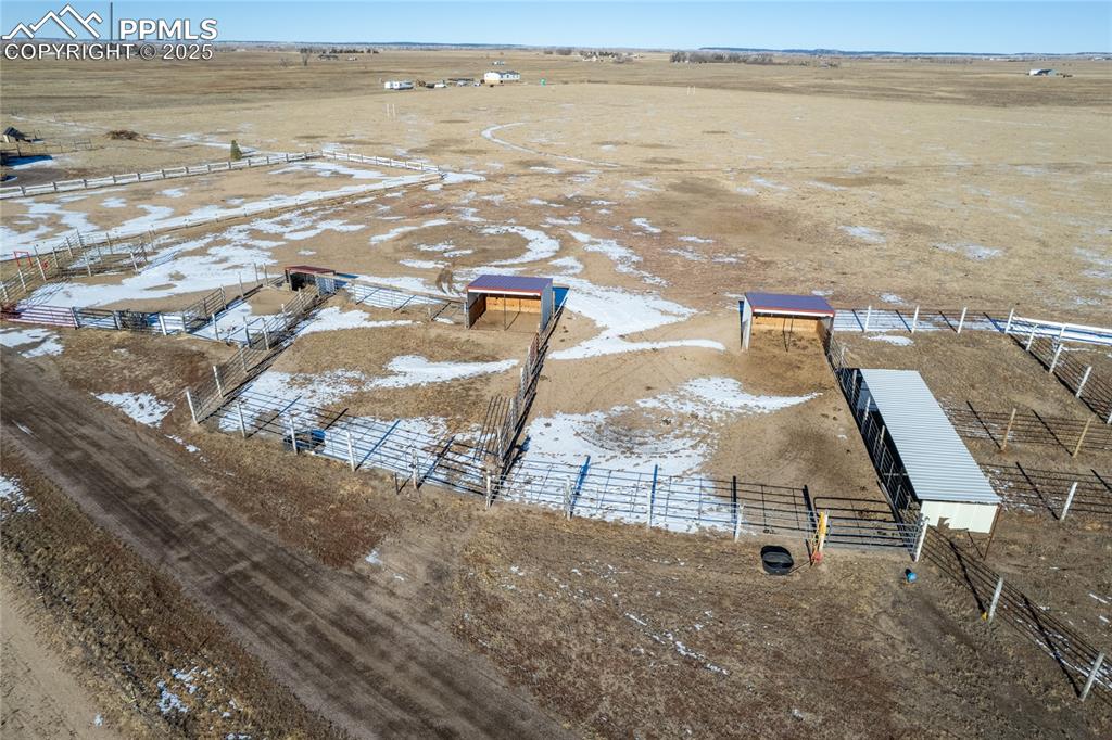 7880 J D Johnson Road Peyton, CO 80831 - Photo 31 of 50 a view of an ocean and beach