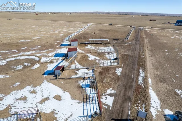 an aerial view of residential building and ocean