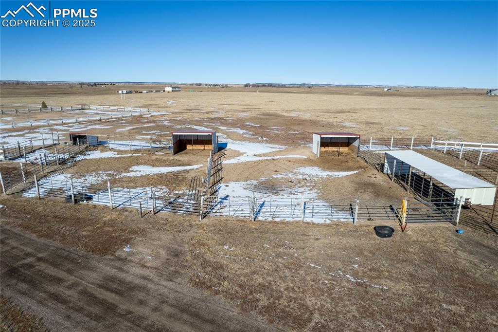 7880 J D Johnson Road Peyton, CO 80831 - Photo 38 of 50 an aerial view of residential building and ocean