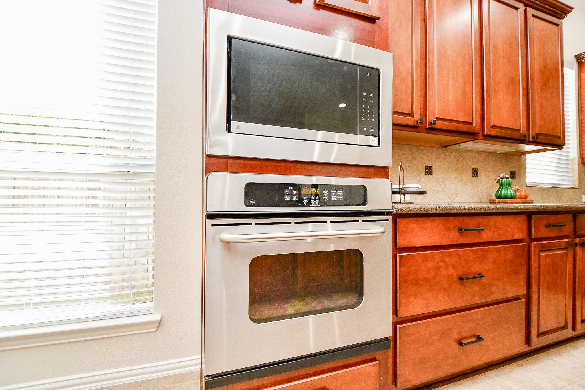 45 Cherry Hills Houston, TX 77064 - Photo 17 of 49 This kitchen is loaded with granite countertops, and some new stainless steel appliances.