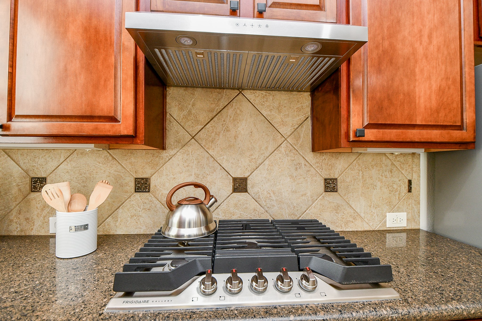 45 Cherry Hills Houston, TX 77064 - Photo 21 of 49 a kitchen with a stove and cabinets