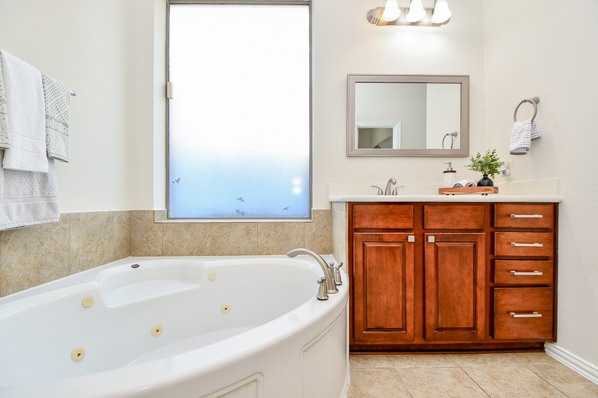 45 Cherry Hills Houston, TX 77064 - Photo 26 of 49 a bathroom with a bathtub and a sink