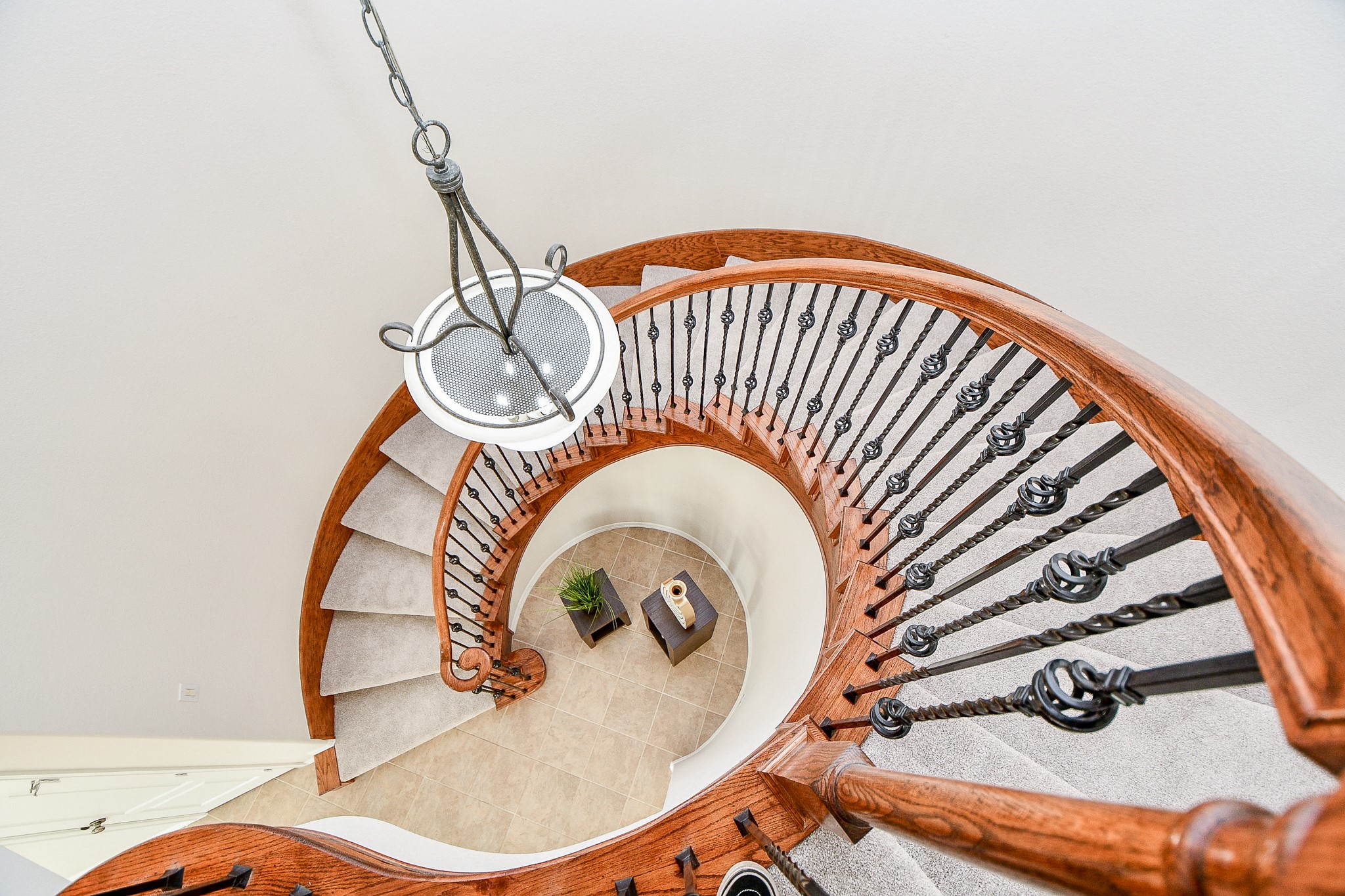 45 Cherry Hills Houston, TX 77064 - Photo 31 of 49 Gorgeous view of the decorative iron balusters in the impressive staircase to downstairs.