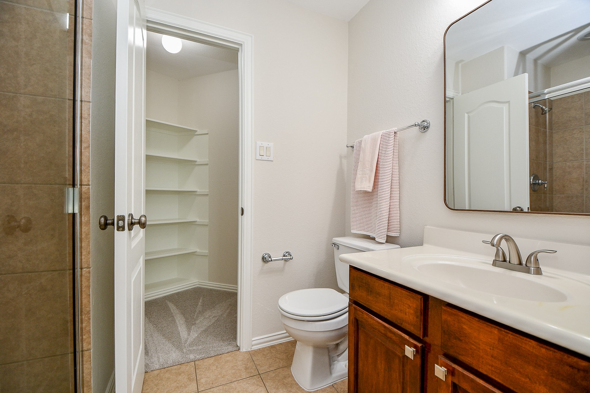 45 Cherry Hills Houston, TX 77064 - Photo 39 of 49 a bathroom with a granite countertop sink toilet and shower
