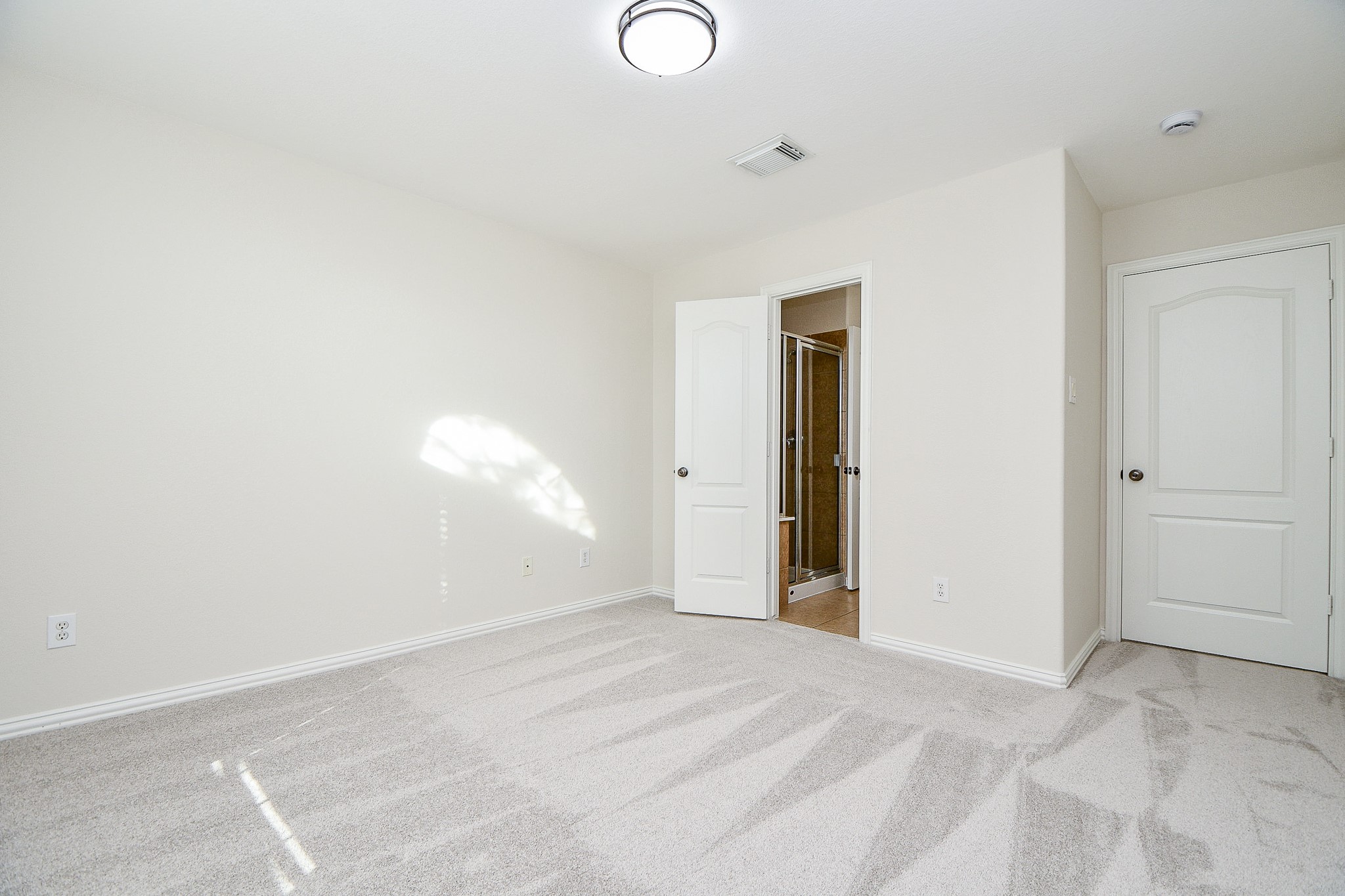 45 Cherry Hills Houston, TX 77064 - Photo 41 of 49 Another view of this spacious bedroom to the private bathroom.
