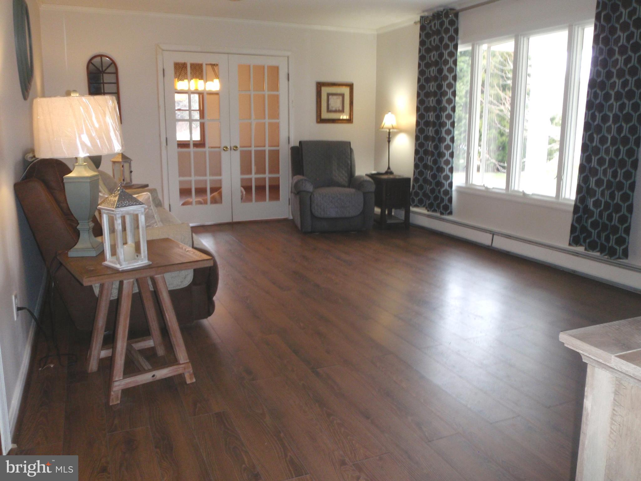 377 Paddock Road Smyrna, DE 19977 - Photo 3 of 58 Bright & Sunny Living Room with Bay Window