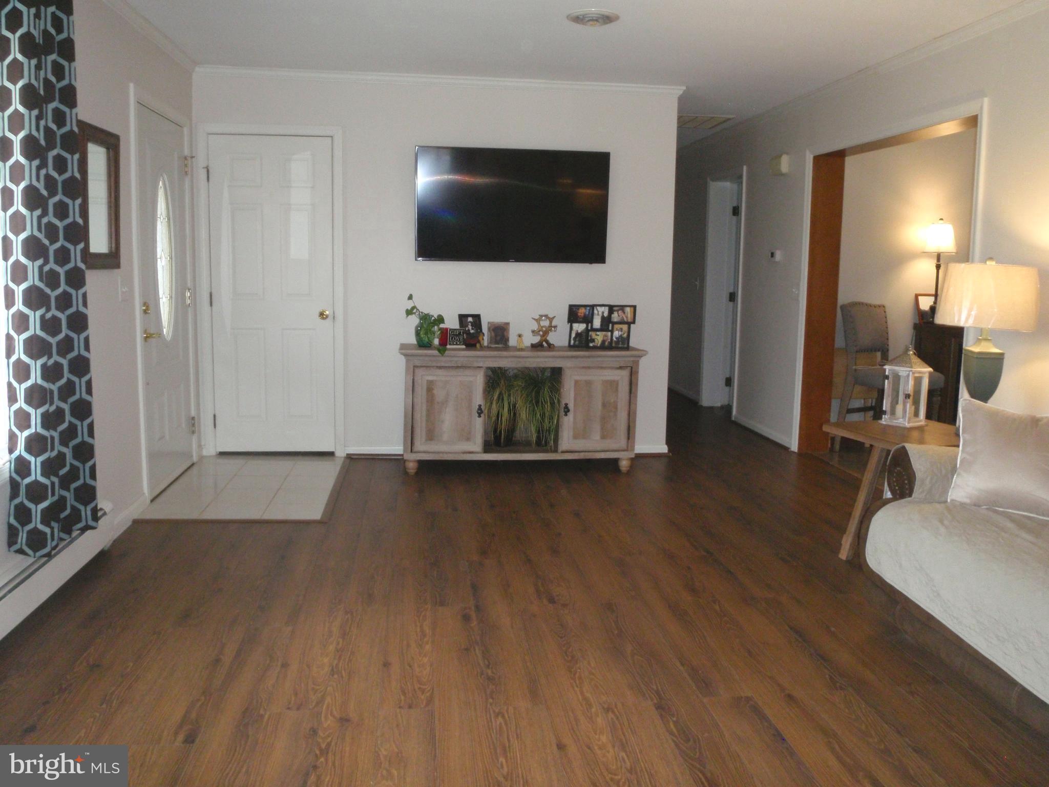 377 Paddock Road Smyrna, DE 19977 - Photo 5 of 58 New Laminate Flooring for easy maintenance