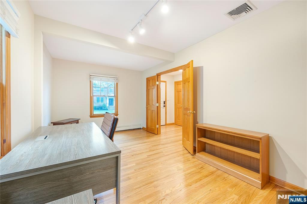 75 Columbus Drive Tenafly, NJ 07670 - Photo 12 of 26 a view of an empty room and window