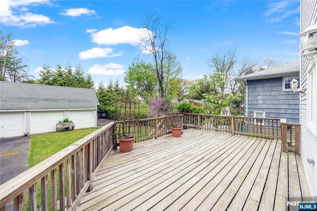 75 Columbus Drive Tenafly, NJ 07670 - Photo 23 of 26 a view of balcony with deck and wooden floor