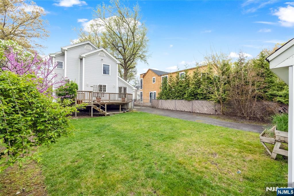 75 Columbus Drive Tenafly, NJ 07670 - Photo 25 of 26 a view of a house with backyard and sitting area