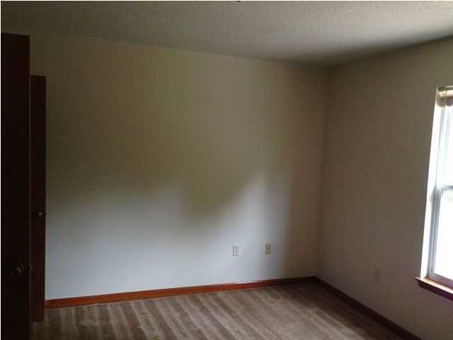 6018 Sand Hill Road Crestview, FL 32539 - Photo 10 of 11 a view of an empty room and window