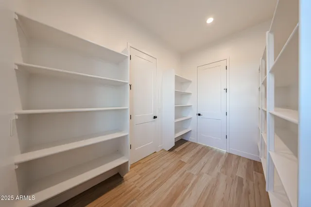 a view of a white house with a outdoor space