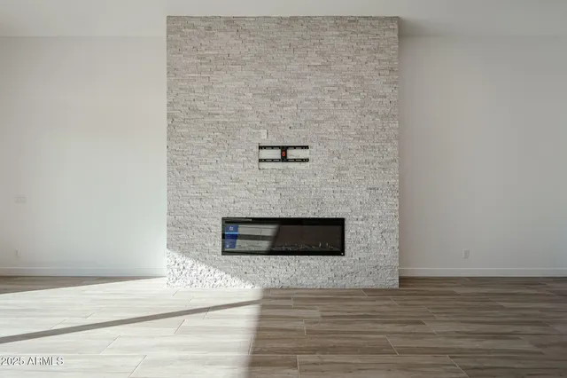 a close view of a stove a microwave and door