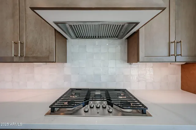 a view of room with wooden floor