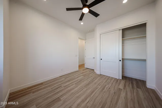 a bathroom with a double vanity sink mirror double and a bathtub