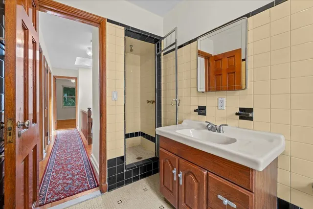 a kitchen with stainless steel appliances granite countertop a stove and a refrigerator